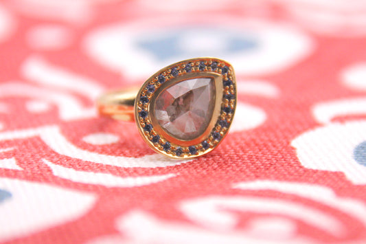 Pear Cut Diamond and Sapphire Halo