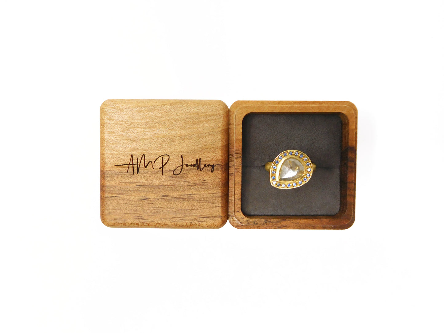 Pear Cut Diamond and Sapphire Halo